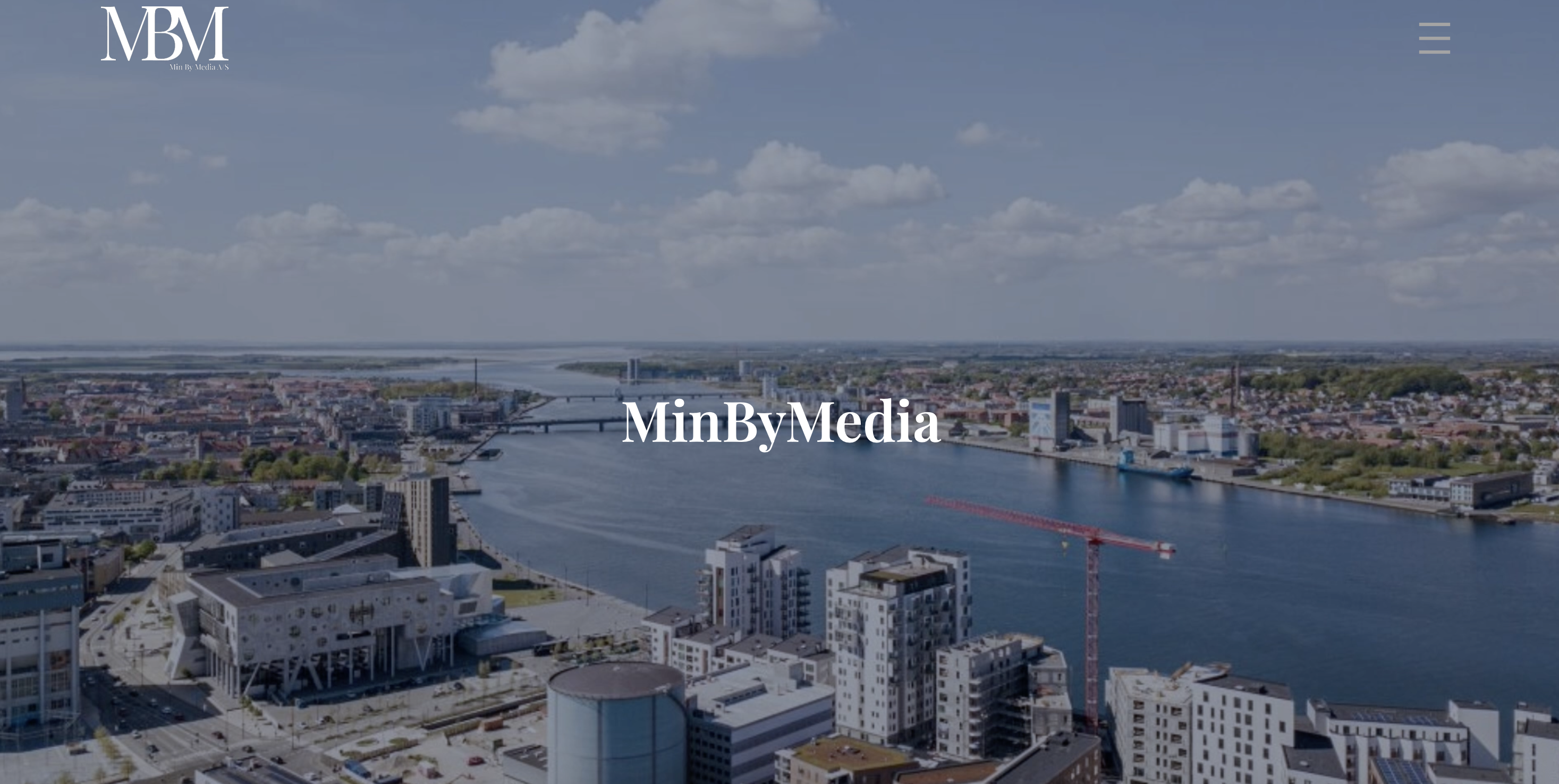 Webdesign med MBM-logo, Aalborg-billede og navigation